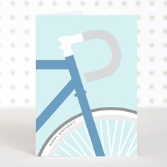 a card with a blue bicycle on it