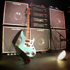 an electric guitar sitting on top of a stage