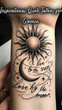 a sun and moon tattoo on the side of a woman's arm with words written in