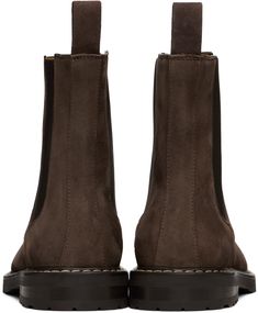 Ankle-high Chelsea boots in suede. They feature elasticized gussets at sides, a pull-loop at heel collar, grained leather lining, topstitching at welt, a stacked leather midsole, and a treaded foam rubber sole. Brown Suede Chelsea Boots, Suede Chelsea Boots, Brown Suede, Chelsea Boots, Dark Brown, Rubber Sole, Chelsea, Ankle Boots, Top Brands