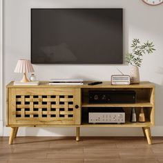 Infuse your home with rustic charm through this wooden TV stand, designed with a basket weave door that enhances airflow while exuding a warm, handcrafted vibe. Ideal for farmhouse or bohemian interiors, it offers distinct public and private storage spaces for easy access to everyday items while discreetly concealing personal belongings. Made from durable P2-grade particle board and MDF, and featuring sturdy oak legs, it ensures exceptional stability. Whether in your living room, bedroom, or ga… Modern Tv Entertainment Center, Creative Tv Stand, Living Room Storage Cabinets, Cabinets For Living Room, 55 Inch Tv, Entertainment Center With Storage, Tv Console Cabinet, Large Cabinets, Tv Entertainment Center