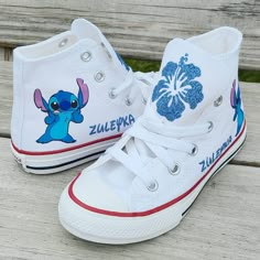 Stitch and her name on each shoe al9ng with hibiscus flowers in glittery blue on the tongues. Choose your size and color during checkout. Stitch Clothes Size 6, Cute Nike Shoes Disney, Disney Air Force 1 Elsa Frozen, Stitch Shoes, Stitch Merchandise, Converse Design, Stitch Things, Lilo And Stitch Merchandise, Lilo And Stitch Quotes