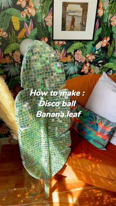 an image of a disco ball banana leaf in front of a wallpapered background