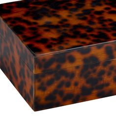 an animal print box on a white background