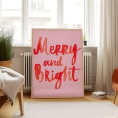 a merry and bright sign in front of a window next to a radiator