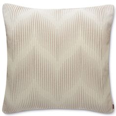 a white and beige striped pillow on a white background with a brown corded design