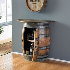 there is a wooden barrel with wine in it