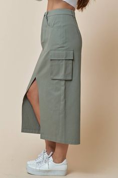 This stylish Cargo Utility Skirt is a great addition to your casual wardrobe. Featuring belt loops, a zip-fly and a button closure, and handy utility pockets, you'll be ready to take on any adventure! All in the comfort of 100% cotton. What are you waiting for? Suit up! Cotton Workwear Skirt With Multiple Pockets, Cotton Work Skirt With Multiple Pockets, Utility Cotton Cargo Skirt, Fall Utility Cargo Skirt With Pockets, Utility Skirt With Pockets For Work, Utility Skirt With Side Pockets For Fall, Fall Utility Skirt With Side Pockets, Utility Cargo Skirt With Pockets, Khaki Utility Cargo Skirt With Side Pockets