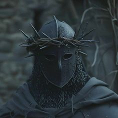 a man wearing a crown of thorns on his head