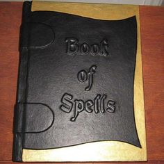 the book of spells is made out of black leather