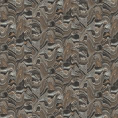 an abstract pattern made up of different shades of grey and brown marbled paper with wavy lines