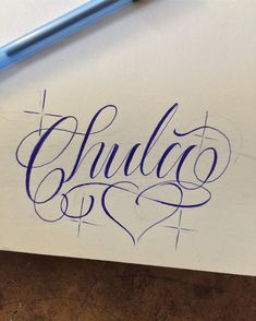 a piece of paper with the word chicago written in cursive writing