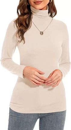 10+ Classy Tops To Wear With Jeans - By Lisa Fonde Roll Neck Top, Turtleneck T Shirt, White Shirts Women, Turtle Neck Jumper, Layer Top, Fancy Dresses Party, Turtleneck Top