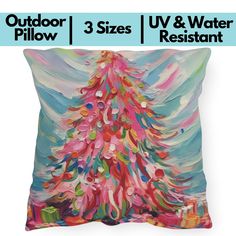 a colorful christmas tree pillow with the words outdoor pillows 3 sizes / iv & water resistant