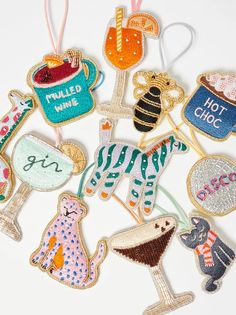 several different types of handmade ornaments on a white surface with the words hot chocolate