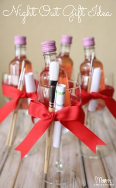 some bottles with lipstick and toothbrushes in them