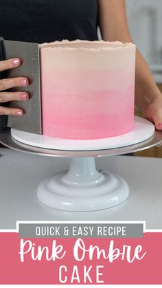 a pink ombree cake with the words quick and easy recipe on it, in front of a woman holding a knife