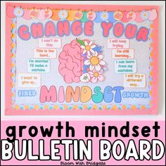 a bulletin board with the words change your minds and a pink flower on it in front of