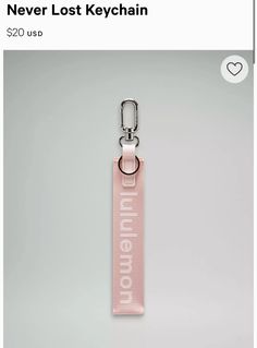 a pink keychain that says never lost keychain on it's side