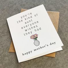 two greeting cards with flowers in a vase