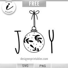 a christmas ornament with the word joy hanging from it's side, and an