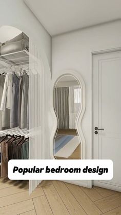 an open closet with clothes on hangers and a mirror in the corner that says popular bedroom design