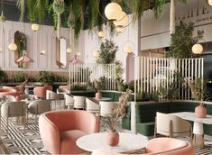 the interior of a restaurant with pink and green chairs, white tables and plants hanging from the ceiling