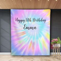 a birthday backdrop with the words, happy birthday emna on it in rainbow colors