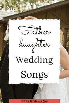 a man and woman standing next to each other in front of a sign that says father daughter wedding songs