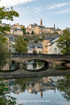 A picture of the Pont du Grund, also known as Pont du Stierchen Bridge, spanning the Alzette River in Luxembourg City's Grund District, with buildings in the background City Bucket List, Solo Trip, The Underground, Beautiful Places To Travel, City Travel, Travel Goals, Beautiful Places To Visit, Travel Inspo