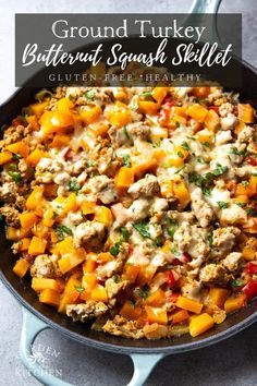 a skillet filled with ground turkey and vegetables