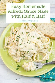 an easy homemade alfredo sauce made with half and half pasta on a green plate next to a slice of bread