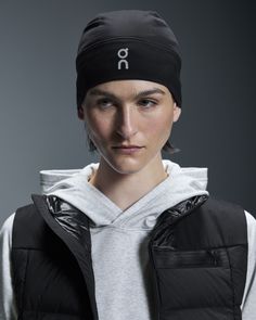 The cold weather running hero with a ponytail opening. Locks in warmth thanks to its brushed lining and head-hugging fit. Soft, brushed material on the inside of the beanie provides insulation against the cold and dries quickly. Ideal for temperatures between 0°C and 10°C. Features a reflective, laser cut logo on the front and branding on the back. Plus, a discreet ponytail opening allows for a more comfortable and flexible fit for those with long hair. Engineered to keep you warm and comfortabl Windproof Sports Hats For Winter, Winter Sports Windproof Hats, Winter Sports Beanie Hat, Functional Black Hats For Winter, Functional Windproof Hats For Winter Sports, Sporty Winter Beanie Hat, Sports Beanie For Winter, Winter Windproof Beanie For Outdoor Activities, Windproof Beanie For Outdoor Activities