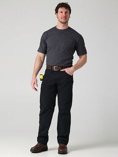 RELAXED & WORK-FRIENDLY Stay comfortable on and off the clock in Wrangler’s relaxed-fit workwear pant. Providing room through the leg without feeling too loose, these pants give you total freedom of movement as you power through projects both big and small. They come fully equipped with front pockets and back pockets as well as a side utility pocket and a reinforced patch for storing your tape measure or pocket knife. Plus, these pants are crafted from a twill cotton/polyester blend to ensure la Workwear Fashion Men, Alien Outfit, Work Wear Men, Dad Fits, Resident Alien, Men's Retro Style, Wrangler Pants, Class Outfit, Shirt Jacket Men