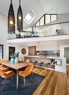 an open floor plan with wood floors and white walls is shown in this modern home