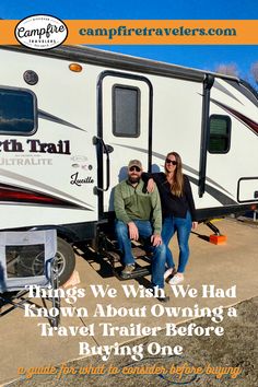 a man and woman sitting in front of an rv with the caption, things we wish we had known about owning a travel trailer before buying one