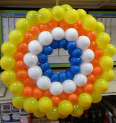 a wreath made out of balloons in a store