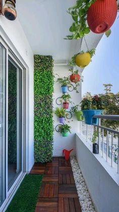 an outdoor balcony with plants and potted plants on the wall, along with text overlay that reads beautiful balcony ideas