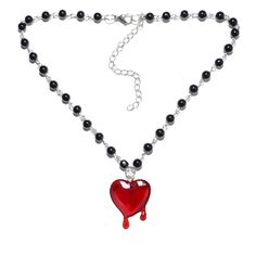 PRICES MAY VARY. Unique Design: The design of this Y2k style necklace is very avant-garde, the chain of the necklace is strung with black beads, the pendant is a red heart that is dripping blood, the heart is a symbol of love, this necklace is perfect for those who love gothic and vampire style. Reliable Material: This necklace is made of high quality acrylic beads and alloy materials, acrylic beads are non-toxic, odorless, hypoallergenic, harmless to the human body, not easy to wear for a long Emo Heart Pendant Metal Necklaces, Emo Heart Pendant Metal Necklace, Black Chain Necklace For Valentine's Day, Edgy Heart-shaped Halloween Necklace, Black Valentine's Day Necklace, Valentine's Day Black Chain Necklace, Black Heart Pendant Edgy Jewelry, Emo Choker Necklaces For Valentine's Day, Emo Choker Necklace For Valentine's Day