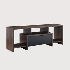 an entertainment center with two shelves on each side and a drawer underneath the shelf for storage