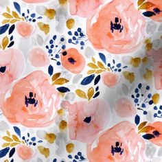 an orange and blue floral print on white fabric