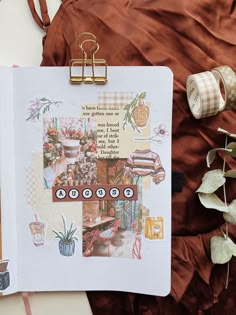 an open book with pictures on it next to some plants and other things in the background