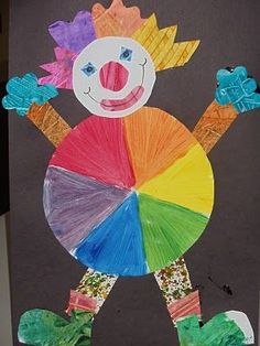 a colorful paper doll made to look like a clown