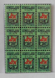 a green and black stamp with red letters on it