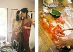 two women are preparing food in the kitchen and on the dining room table, one is cutting tomatoes