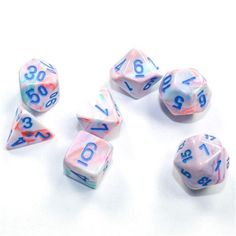 six dice with numbers on them sitting next to each other in front of a white background