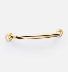 a gold door handle on a white background