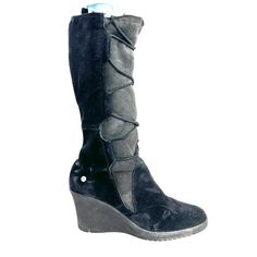 Do You Luv A Wedge In Winter? This Ugg Elsey Women's Size 11 Black Suede Leather Wedge Mid Calf Boot Is Ready For All Of Your Adventures. It Laces Up For Style And Attitude. The Wedge Gives A Sleek Look. Sheepskin Lined For Warmth And Comfort. Wedge About 3"; Shaft About 12" And Circumference About 14.5". Good Condition. Normal Wear. Spots Around. Suede Has Normal Rubbing On Back And Around Bottoms. Normal Sole Wear. This Is A Pre-Owned Item And May Have Fading Or Discoloration, Marks Or Stains, Winter Black Suede Wedge Boots, Black Suede Wedge Boots For Winter, Black Wedge Heel Boots For Winter, Black Wedge Heel Winter Boots, Black Suede Wedge Boots, Suede Wedges, Leather Wedges, Ugg Shoes, Mid Calf Boots