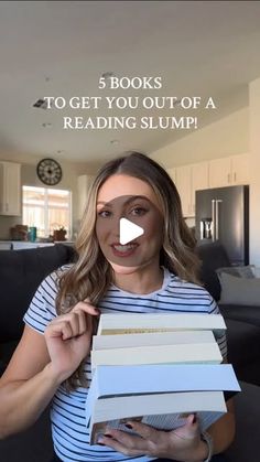 a woman is holding several books in her hands and the text reads, 5 books to get you out of a reading slump