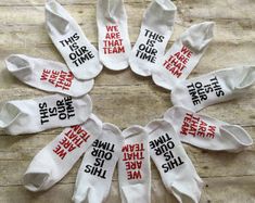 six pairs of socks with words on them that say, this is what she said